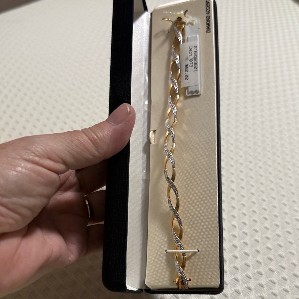 Elegant Gold and Silver Twist Bracelet